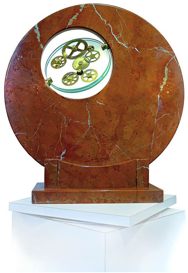 Sculpture Artist Andrea Davide created this kinetic gear art, stone sculpture,