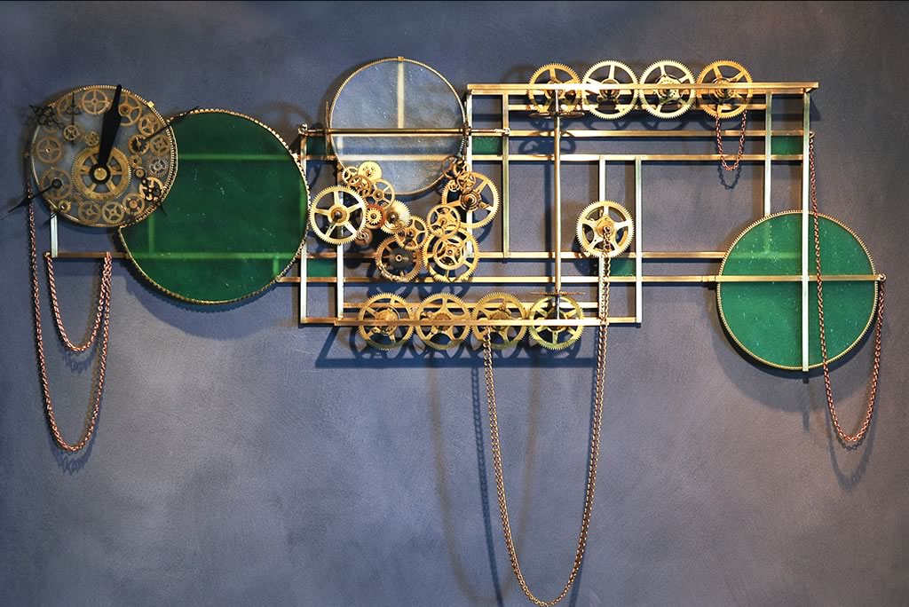 TimePiece 43”w x 38”hWall hanging sculpture made of metal and glass and gears
